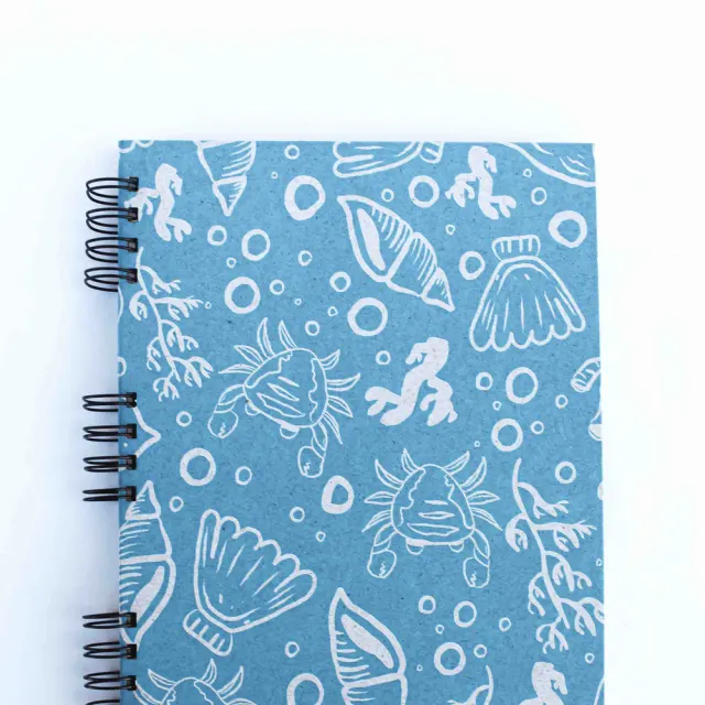 Caderno colegial pautado